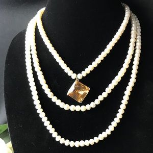 Freshwater pearls 3 strand necklace.